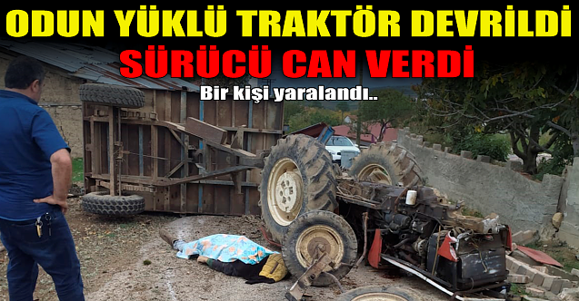 Odun yüklü traktör devrildi: Sürücü can verdi!