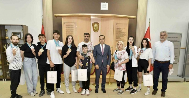 Şampiyon sporculardan Osman Ercan’a ziyaret